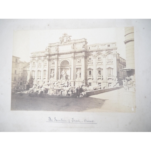 5255 - A late 19th Century grand tour photograph album containing approx. 100 mounted photographs of Paris,... 