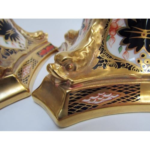 6227 - A pair of Royal Crown Derby 1128 Imari pattern candlesticks, 27cm tall   (C)