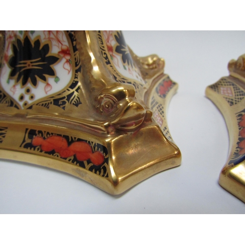 6227 - A pair of Royal Crown Derby 1128 Imari pattern candlesticks, 27cm tall   (C)
