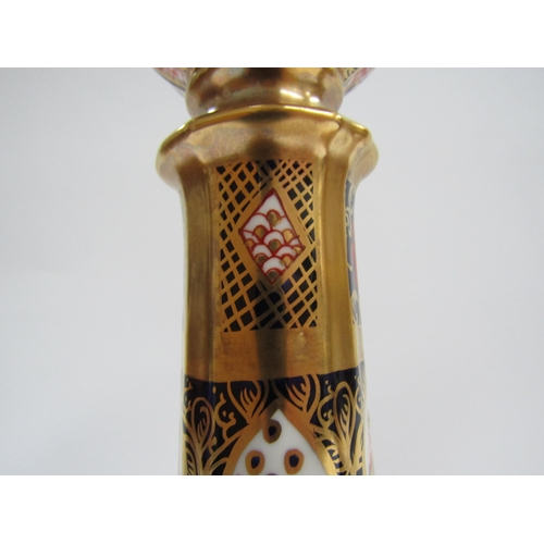 6227 - A pair of Royal Crown Derby 1128 Imari pattern candlesticks, 27cm tall   (C)