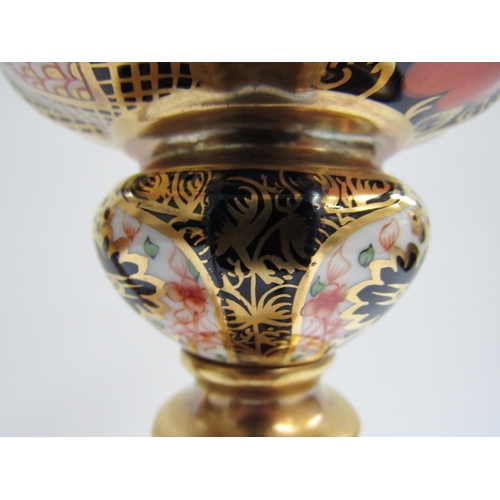 6227 - A pair of Royal Crown Derby 1128 Imari pattern candlesticks, 27cm tall   (C)