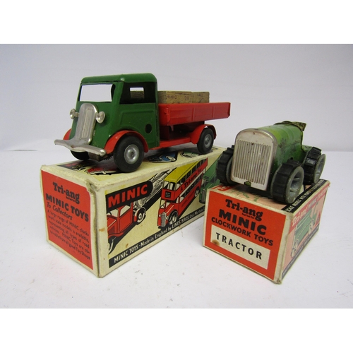 7089 - Two boxed Triang Minic tinplate clockwork vehicles to include Tractor (one rubber track disintegrate... 