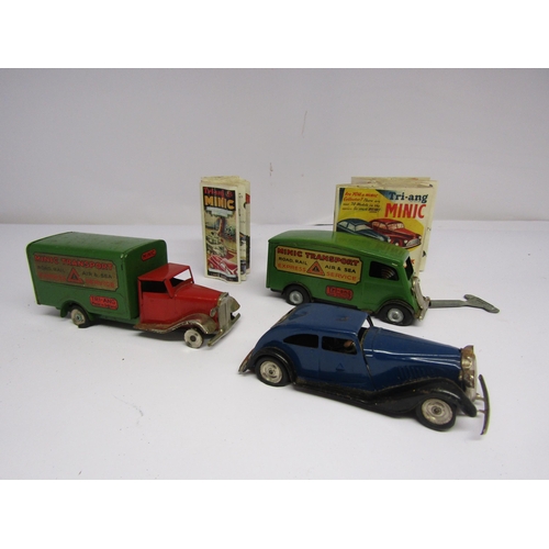 7090 - Four unboxed Triang Minic clockwork vehicles to include armoured car (damaged), two Minic Transport ... 