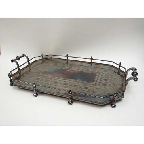 6105 - An impressive Walker & Hall silver plated galleried tray of octagonal form with engraved border, 60c... 