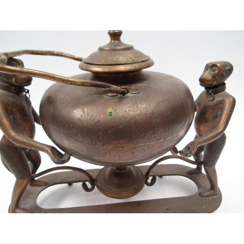 6203 - An Edwardian brass Indian Colonial spirit kettle with standing monkey support, engraved decoration, ... 