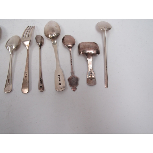 6295 - A box containing eight silver teaspoons, tea caddy spoon, souvenir spoon, condiment spoons and small... 