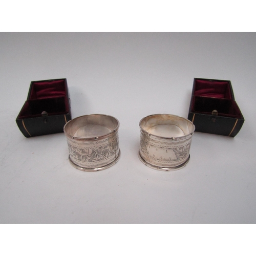 6296 - Two silver napkin rings, boxed, Birmingham 1907 and two others, 81g