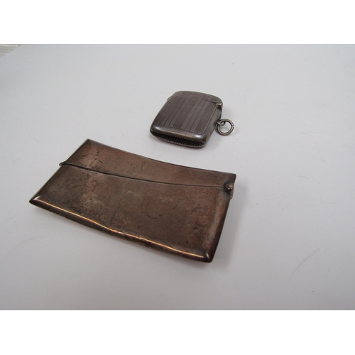 6297 - A silver vesta case and cardcase (2), one monogrammed, vesta 5cm tall, cardcase 8.5cm long, 69g