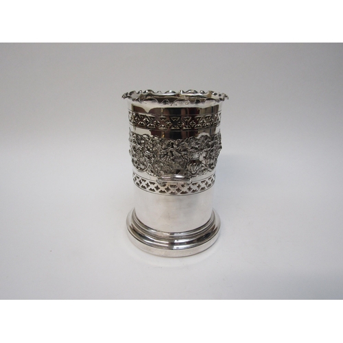 6393 - A silver plated repousse bottle holder with dionysus mask decoration, scrolling vines etc, 19.5cm ta... 