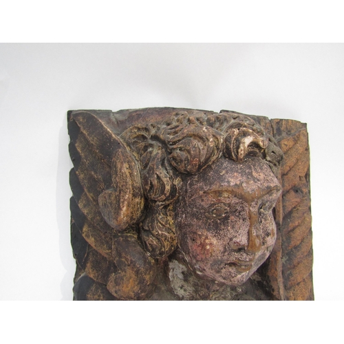 6009 - A 17th Century polychrome, carved wood Angel corbel, 30cm x 28cm