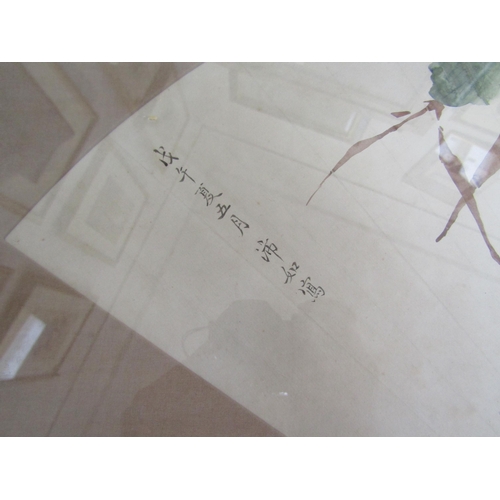 6055 - A Japanese watercolour depicting a wading bird, fan form, character marks to left hand side. 24cm x ... 