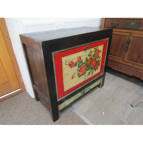 6063 - An Oriental painted two door cupboard with single drawer, floral painted detail, 89cm x 98cm x 46cm
