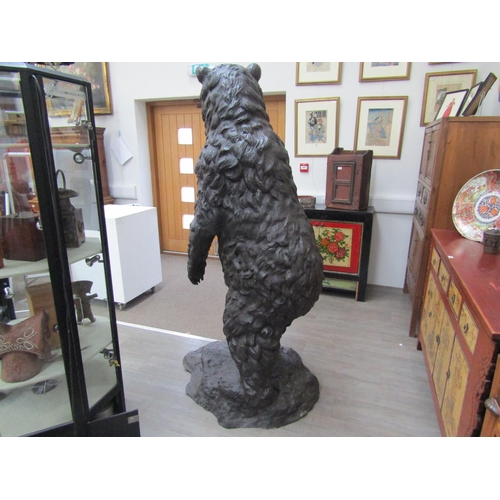 6064 - A large bronze figure of a grizzly bear standing on hind legs, 197cm tall approx     (C)