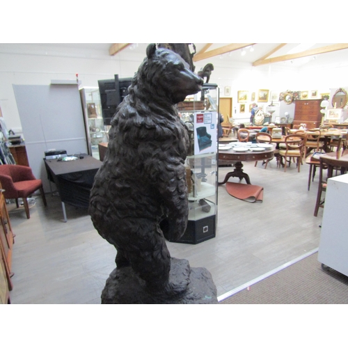 6064 - A large bronze figure of a grizzly bear standing on hind legs, 197cm tall approx     (C)