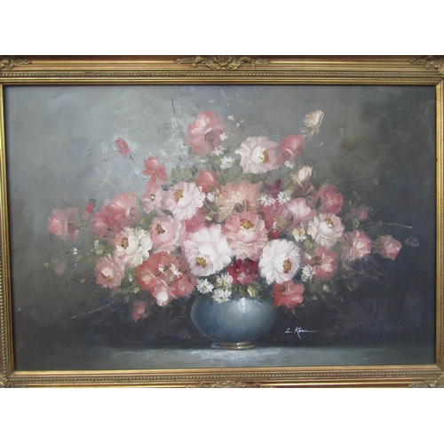 6066 - A 20th Century oil on canvas depicting floral display, signed, 60cm x 90cm