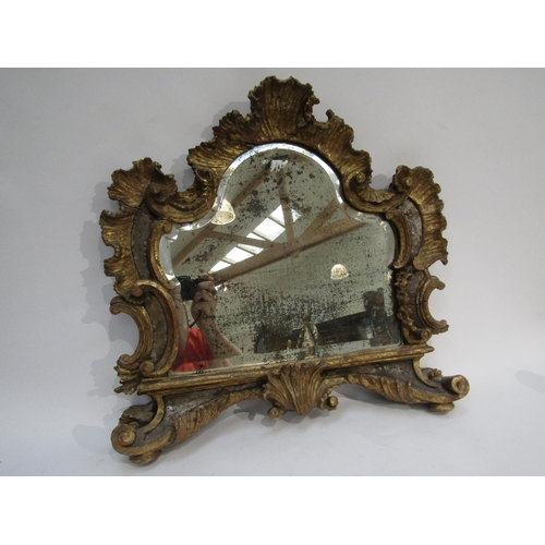 6069 - An 18th Century gilded German mirror frame with acanthus and scroll detail with later glass. Client ... 