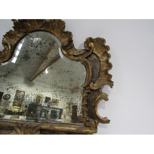 6069 - An 18th Century gilded German mirror frame with acanthus and scroll detail with later glass. Client ... 