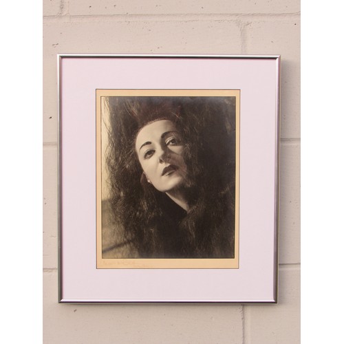 9403 - ANGUS McBEAN (1904-1990) A framed and glazed photograph, portrait in black and white, possibly Quent... 