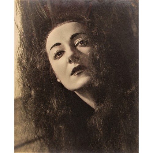 9403 - ANGUS McBEAN (1904-1990) A framed and glazed photograph, portrait in black and white, possibly Quent... 