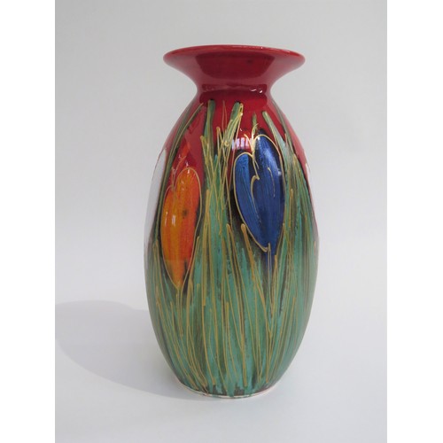 9053 - An Anita Harris Pottery 'Crocus' vase with hand painted detail and gilt lines. Marks to base and sig... 