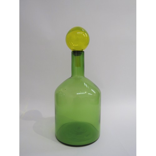 9167 - A Dutch Polspotton Glass bottle vase in green with a yellow glass stopper. 42cm high