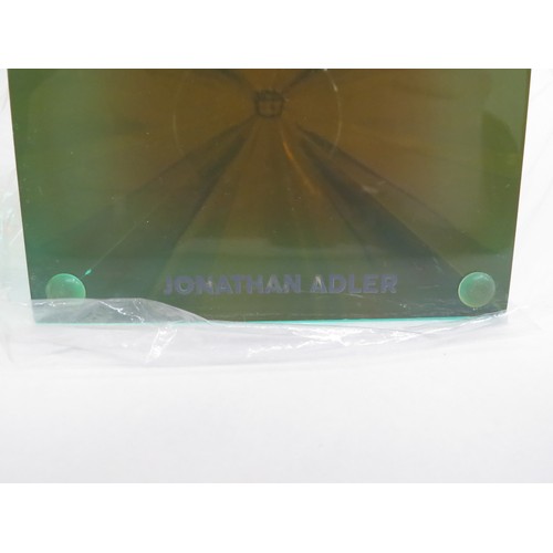 9220 - A Jonathan Adler Lucite obelisk in turquoise, green and orange colours. 26cm high