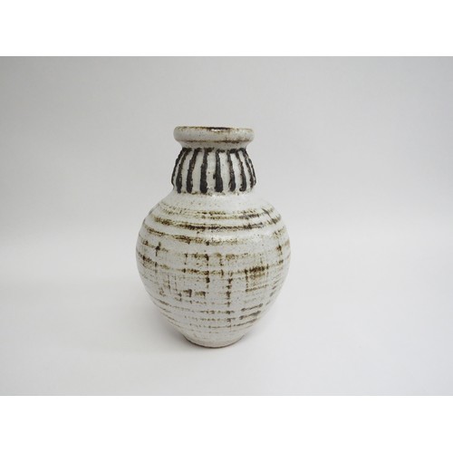 9084 - RAY MARSHALL (1913-1986) A Studio pottery vase with ash glazes, vertical textured line detail to nec... 