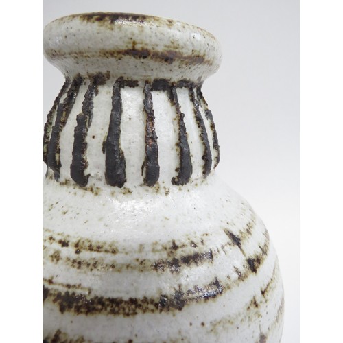 9084 - RAY MARSHALL (1913-1986) A Studio pottery vase with ash glazes, vertical textured line detail to nec... 