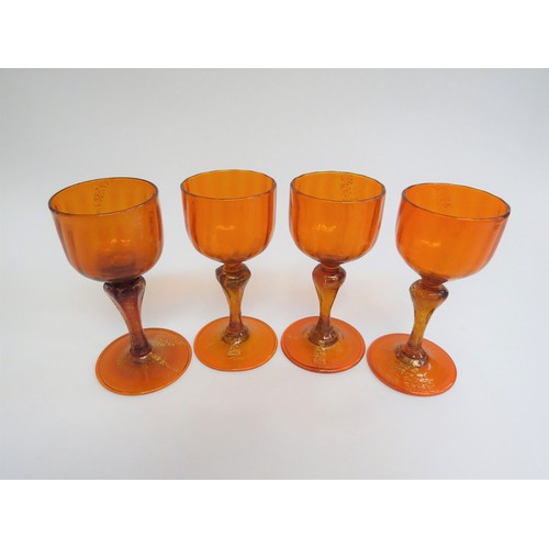 9155 - Four Murano sherry glasses c1960's in orange glass, each with aventurine foil inclusions. 12.5cm hig... 