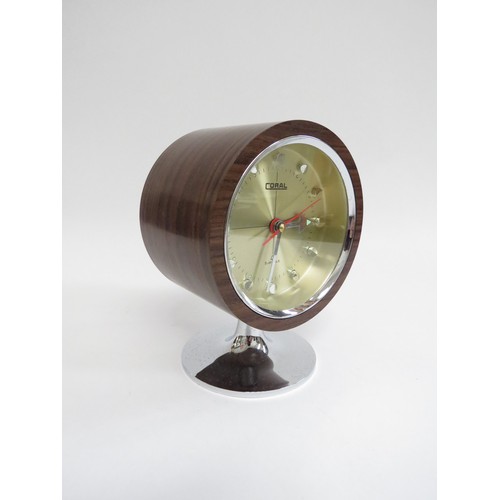 9250 - A c1970's Coral pedestal clock, wood finish on a chromed plastic tulip base. 16cm high