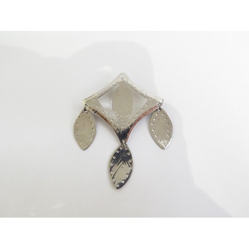 9231 - A 1960's handmade stainless steel brooch by MODA, with stylised leaf droplets   (C)