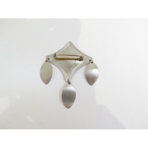 9231 - A 1960's handmade stainless steel brooch by MODA, with stylised leaf droplets   (C)