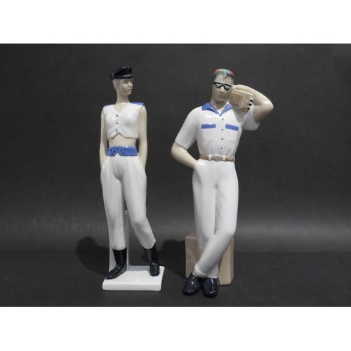 9072 - A pair of Spanish porcelain figures by Miquel Requenna, male with rainbow hair, glasses and a Ghetto... 