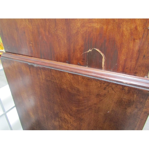 6092 - A Georgian mahogany chest on chest, three small drawers over three long graduating drawers to top an... 