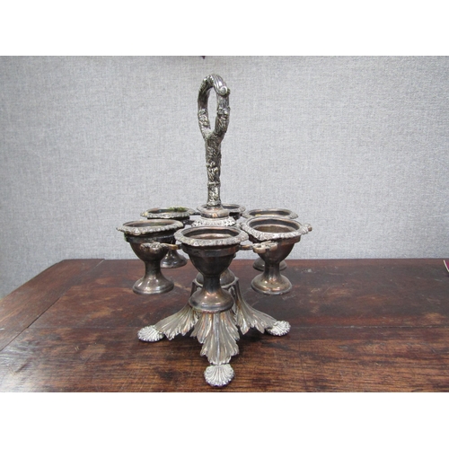 6095 - A silver plated egg cruet for six, 26cm tall