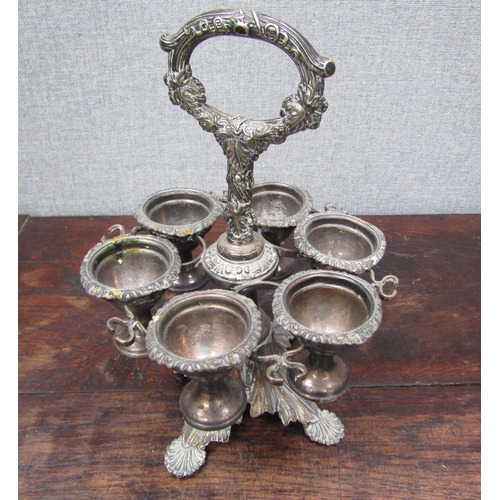 6095 - A silver plated egg cruet for six, 26cm tall