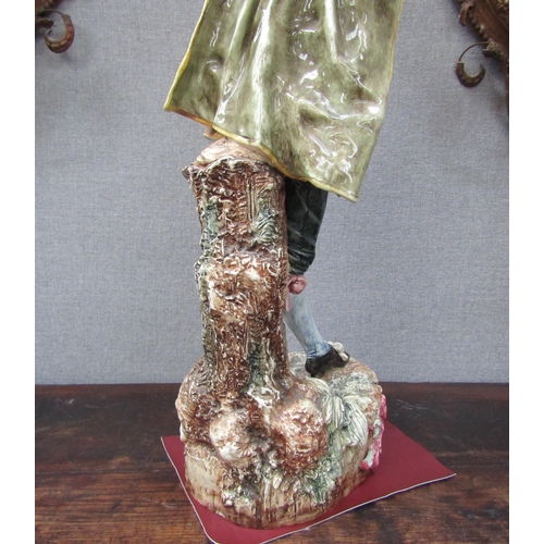 6096 - An early 20th Century ceramic figure of a gent with tambourine, 78cm height