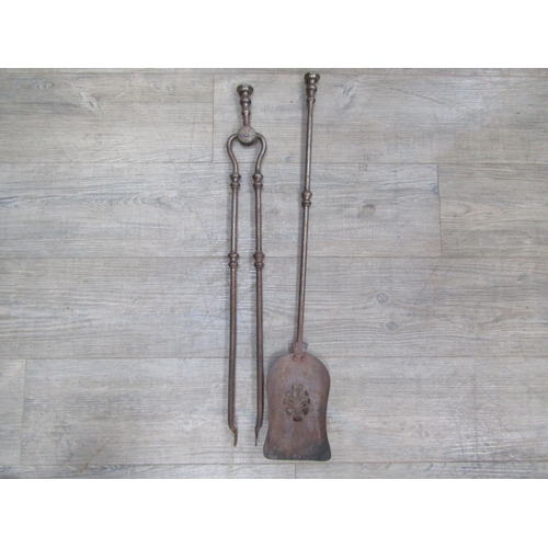 6097 - Two 19th Century fire tools