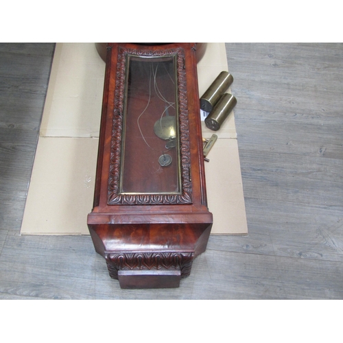 6099 - An early 19th Century Tavern clock by Springall Norwich,  carved flame mahogany case, Roman numerate... 