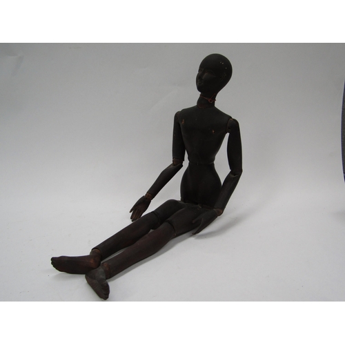 6104 - A 19th Century carved and stained pine artist's lay figure, articulated limbs, 49cm long