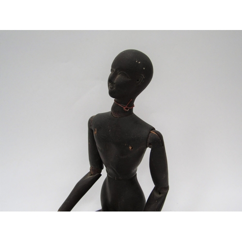 6104 - A 19th Century carved and stained pine artist's lay figure, articulated limbs, 49cm long