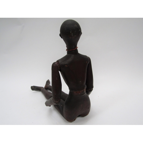 6104 - A 19th Century carved and stained pine artist's lay figure, articulated limbs, 49cm long