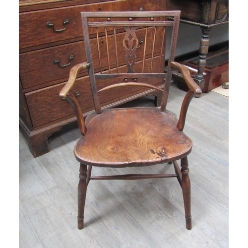6107 - A Mendlesham elm and mahogany stick-back elbow chair on turned legs with an 