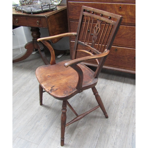 6107 - A Mendlesham elm and mahogany stick-back elbow chair on turned legs with an 