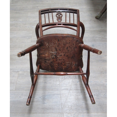 6107 - A Mendlesham elm and mahogany stick-back elbow chair on turned legs with an 