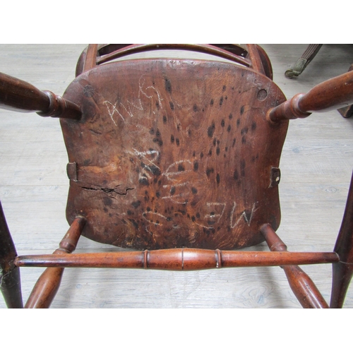 6107 - A Mendlesham elm and mahogany stick-back elbow chair on turned legs with an 