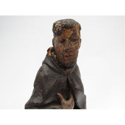 6110 - An 18th Century carved wooden Religious figure of a gentleman, 32cm