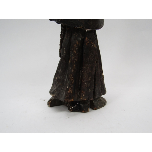 6110 - An 18th Century carved wooden Religious figure of a gentleman, 32cm