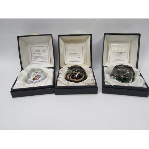 6112 - Three Caithness Christmas paperweights; 1981 'Robin' 299/500, 1979 'Holly Wreath' 51/500 and 1977 15... 