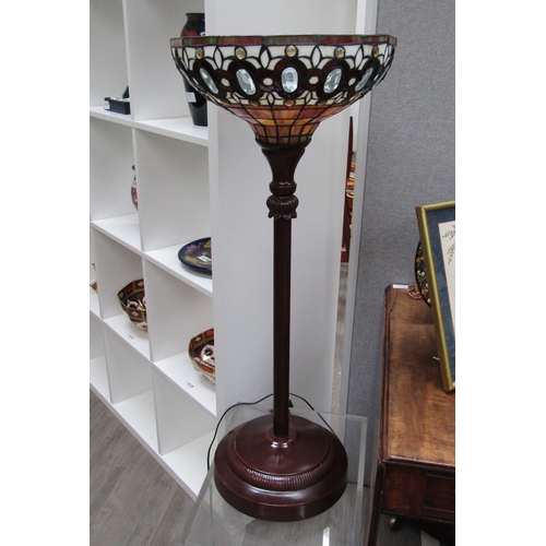 6115 - A Tiffany style leaded glass uplighter on short metal base. 85cm high. Collectors electrical